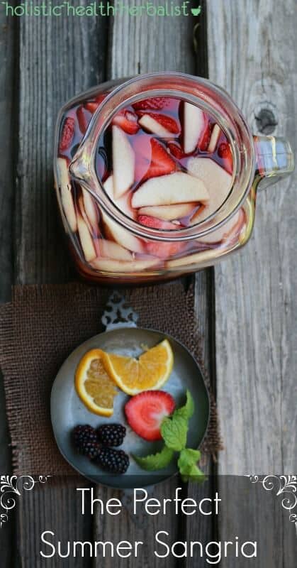 The Perfect Summer Sangria - Made with red wine, 100% pomagranate juice, Cointreau, and fresh fruit!